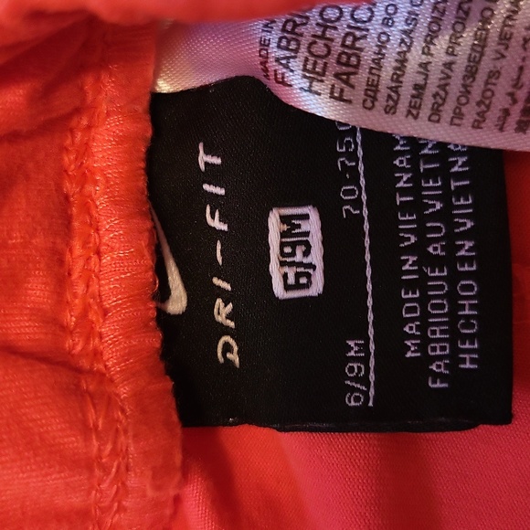 Nike Dri-Fit bright orange athletic pants - Picture 2 of 4
